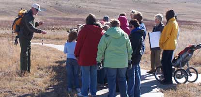Volunteer providing education program for area students.