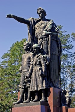 Statute of female figure with children