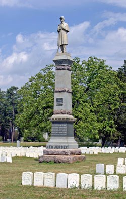 Stone pillar topped with a statue of a US Soldier