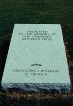 Small marble monument with text