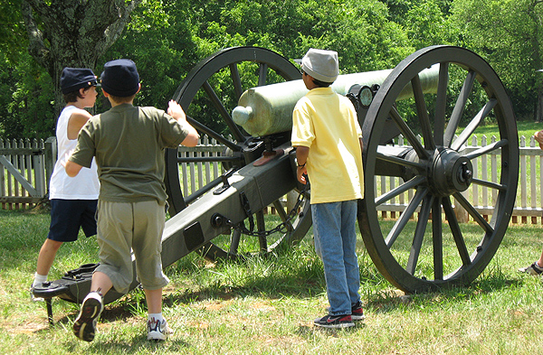 Kids learn the importance of teamwork as they learn how to fire a Civil War cannon.