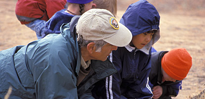 Outdoor education instructor with a local school group