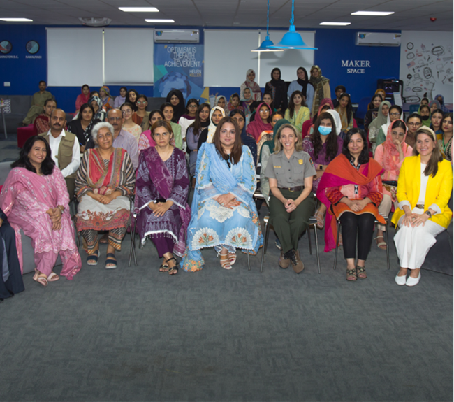 Attendees at the Women's in Conservation workshop sit together for a photo.