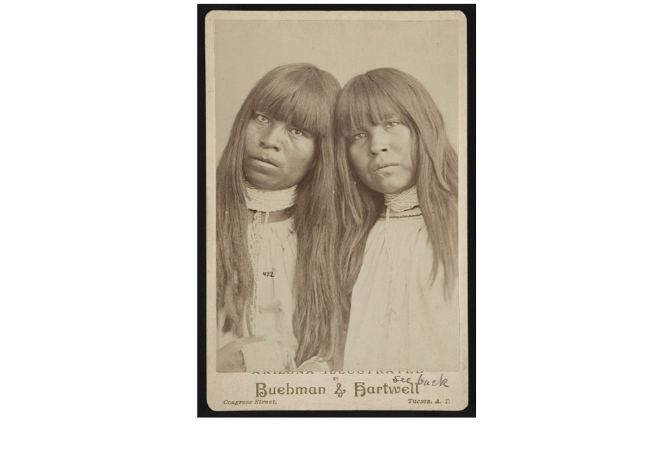 Historic photograph of two pima women posed together. Circa 1881.