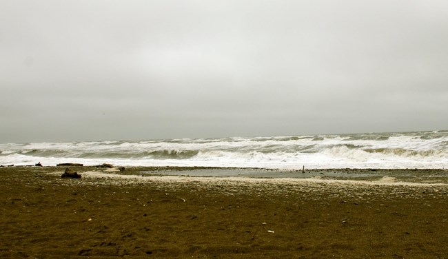 Large waves crashing on the coast.