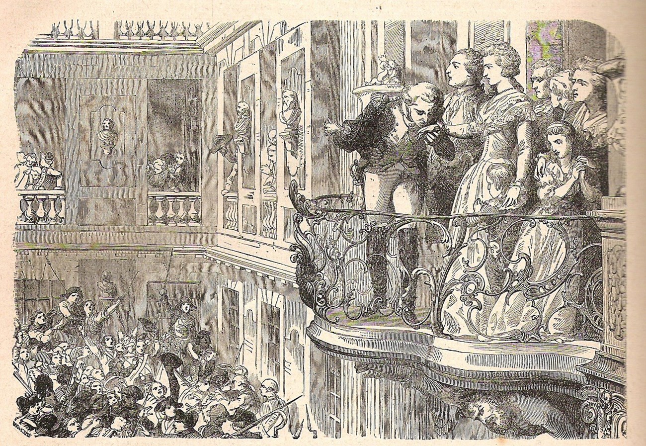 An engraving showing La Fayette kissing Marie Antoinette's hand on a balcony with an angry crowd below
