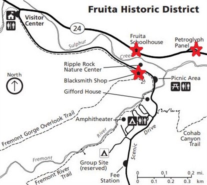 Map of historic district with three stars marking location of audio posts at Blacksmith Shop, Schoolhouse, and Petroglyph Panel.
