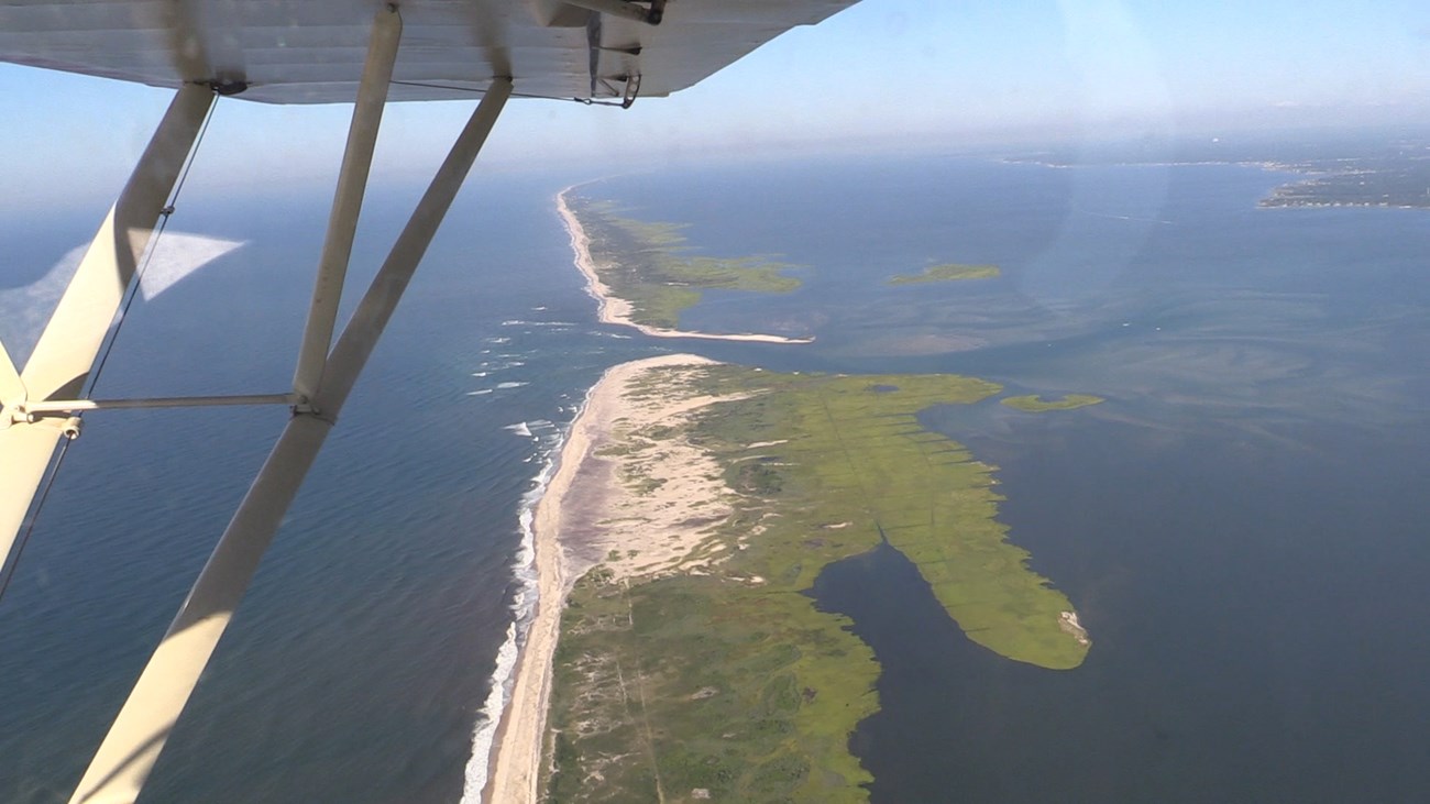 An aerial view of the Fire Island breach looking down from a fixed wing plane