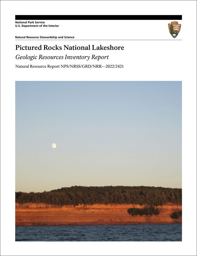 image of report cover with photo of a lakeshore with a tall bluff.