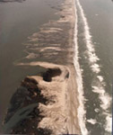 The 1998 storm redistributed tremendous amounts of sand, building new areas of land along the bay side of the island. 23 kb The 1998 storm redistributed tremendous amounts of sand, building new areas of land along the bay side of the island. 23 kb