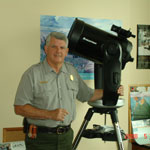 Ranger Larry Smith with the park's Celestron telescope