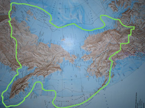 Map of present day Alaska, Eastern Russian and the Bering and Chukchi Seas. A green outline indicates the former expanse of land know as Beringia, the Bering Land Bridge.