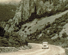 Car driving down the Basin Road, late 1930s.