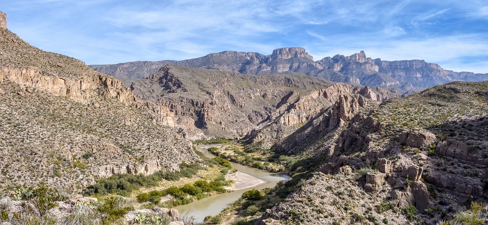View of rugged limestone cliffs and the Rio Grande along the Marufo Vega Trail.