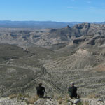 Hikers regard the Rio Grande