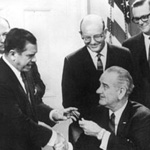 President Johnson shakes the hand of Congressman Dante Fascell while Lloyd Miller and Hardy Matheson look on as Biscayne National Monument is Established on October 18, 1968.
