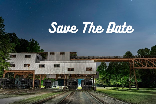 Coal tipple is highlighted in the dark under the stars