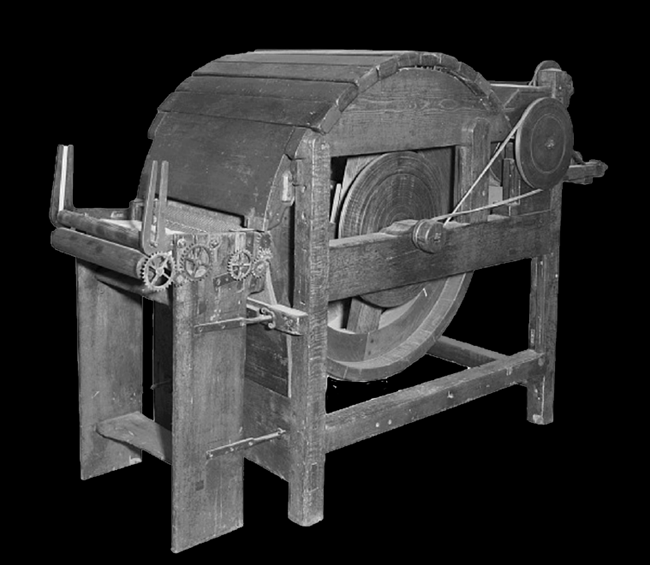 Circular shaped, wood-framed machine