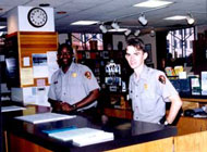 Two rangers waiting to serve the visitors