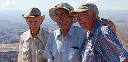 photo: Former Secretary of the Interior Stewart Udall (center) shares a moment with two other Canyonlands pioneers: Kent Frost (left) and Ken Sleight.