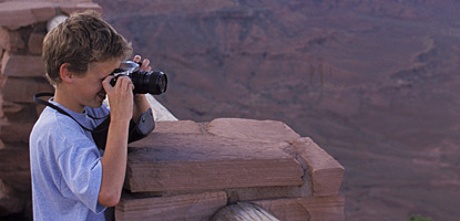 photo: An amateur photographer taking pictures at one of the Island in the Sky's many overlooks