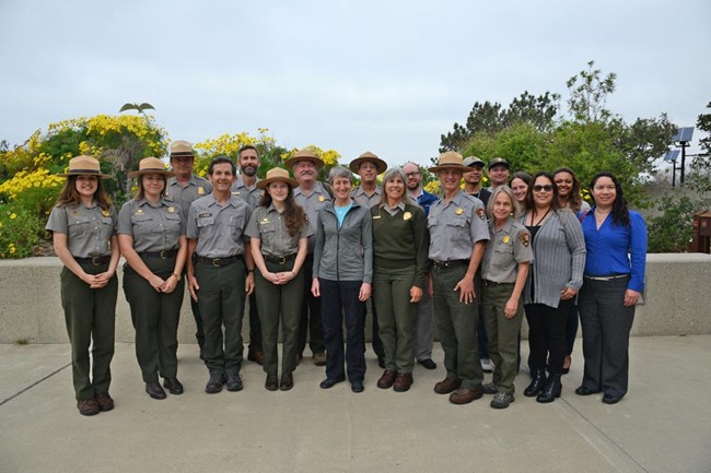 Park rangers gathered together for picture.