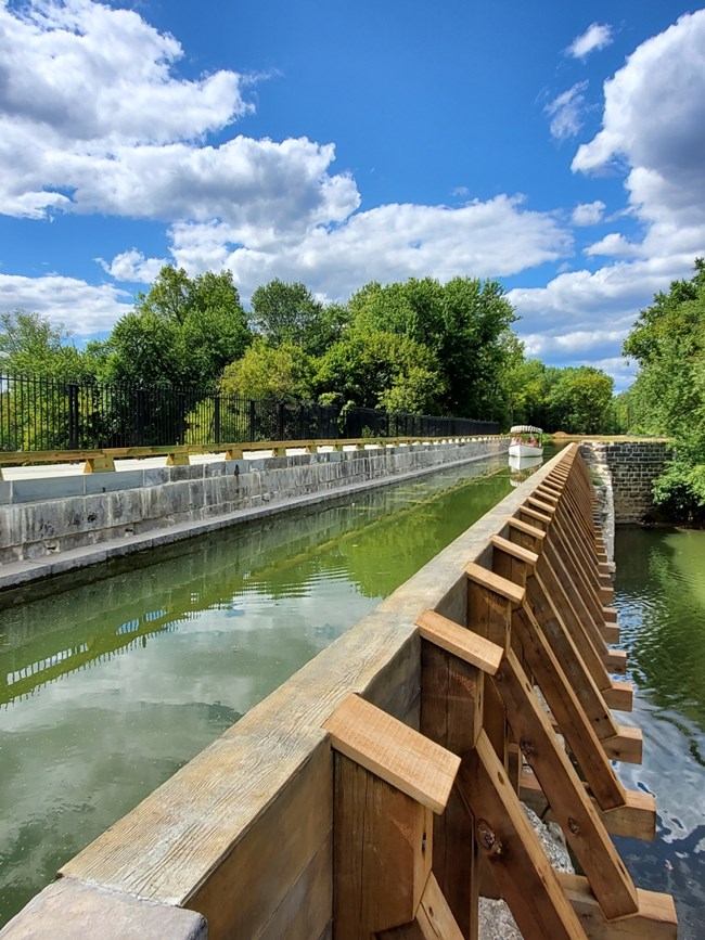 Launch boat tour crossing the aqueduct