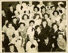 A large group of women wearing different uniforms