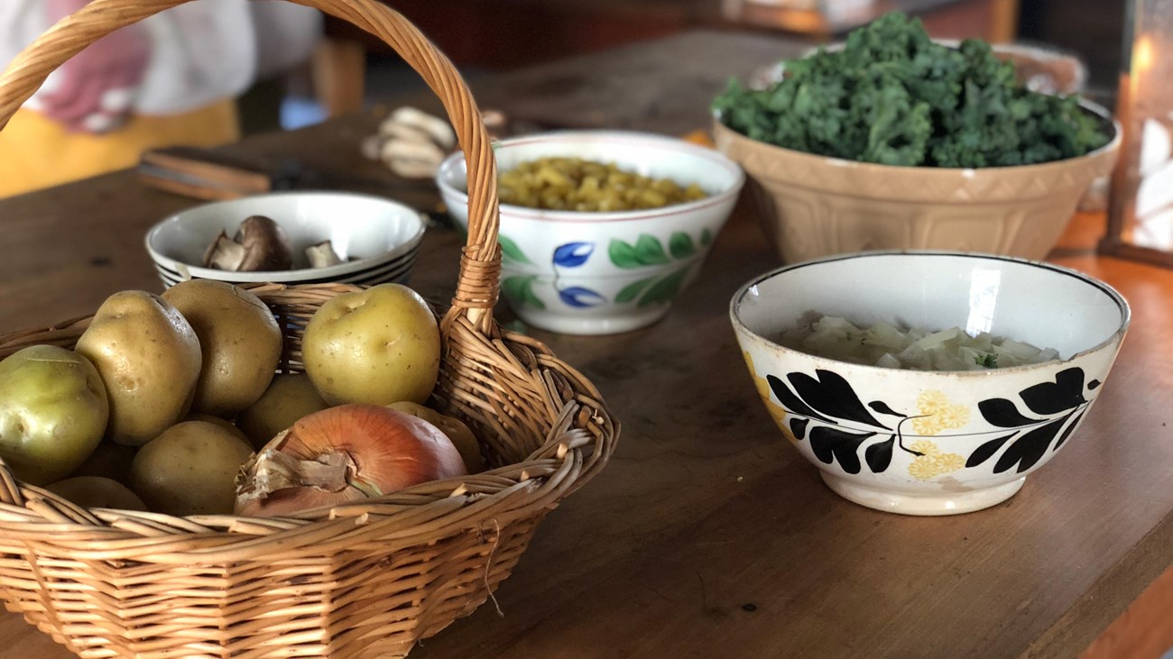 Ingredients in bowls sitting on a table in the Fort Vancouver Kitchen.