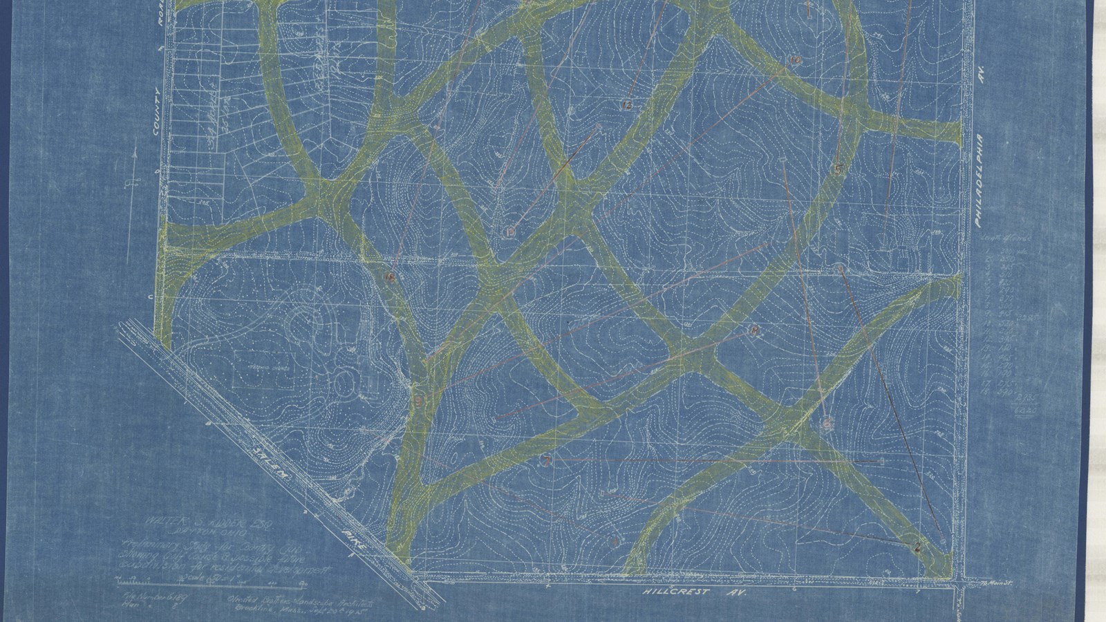 Blueprint of area in between roads with topographical lines and yellow lines for paths