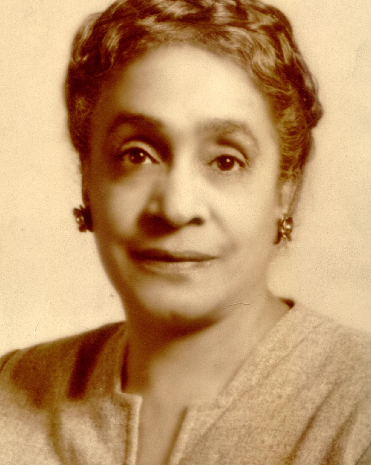 Hattie N.F. Walker seated