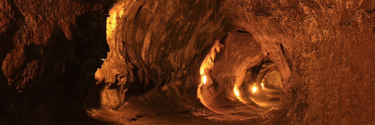lava tube lit by orange electric light