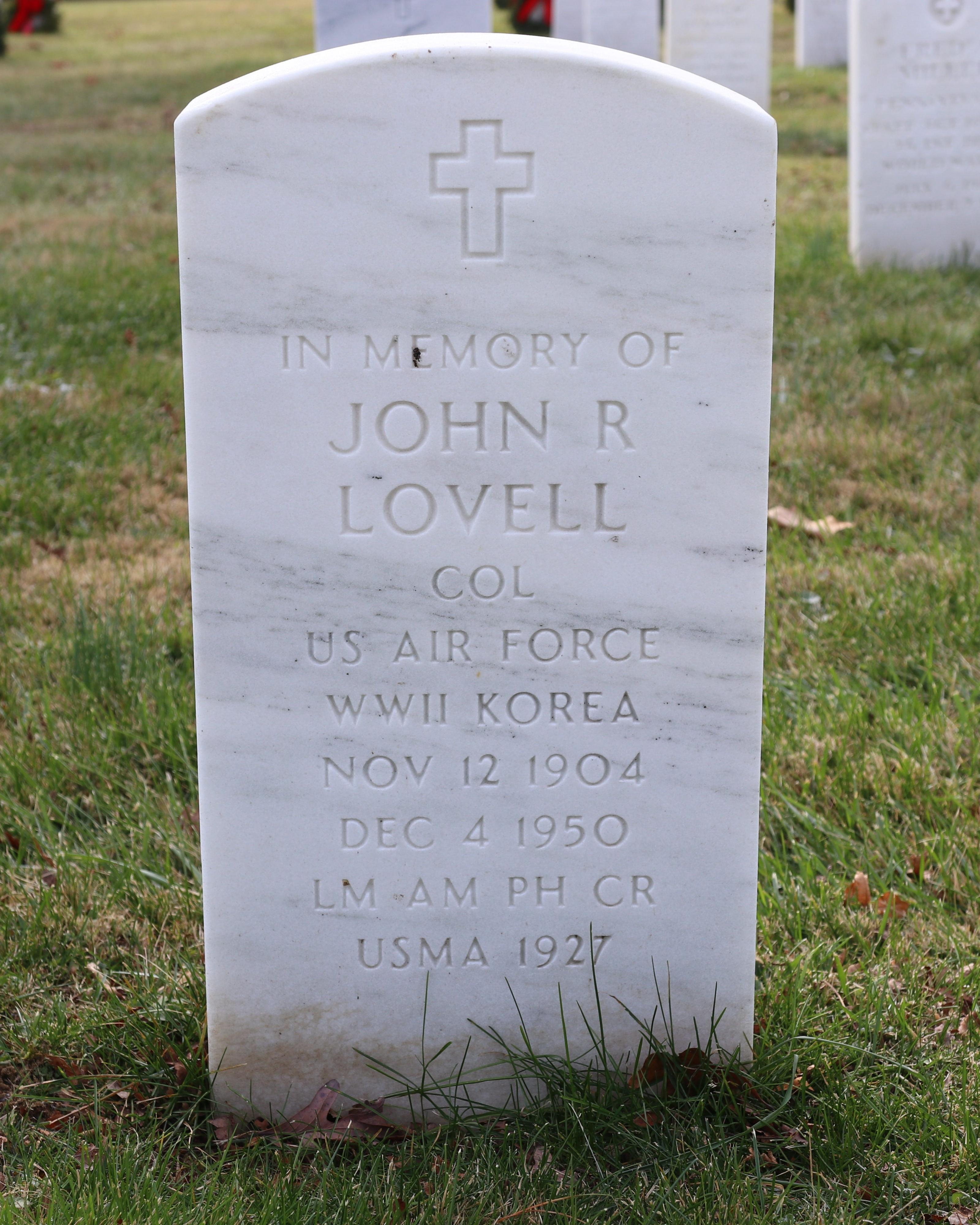 A white granite headstone for Colonel John Lovell