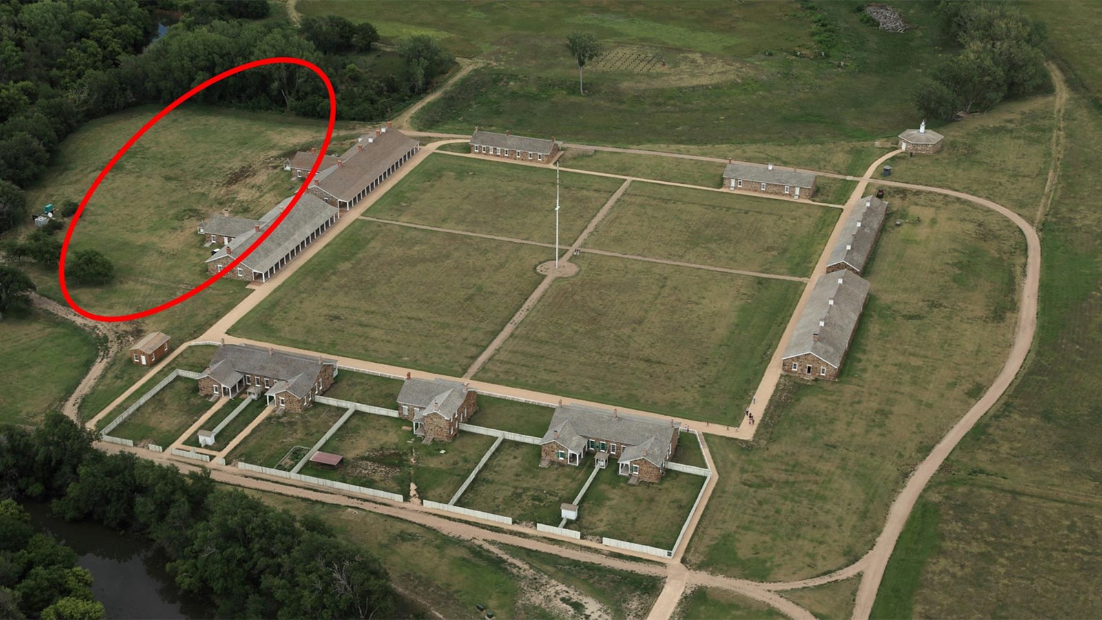Aerial view of Fort Larned with area of early fort structures marked by red circle.