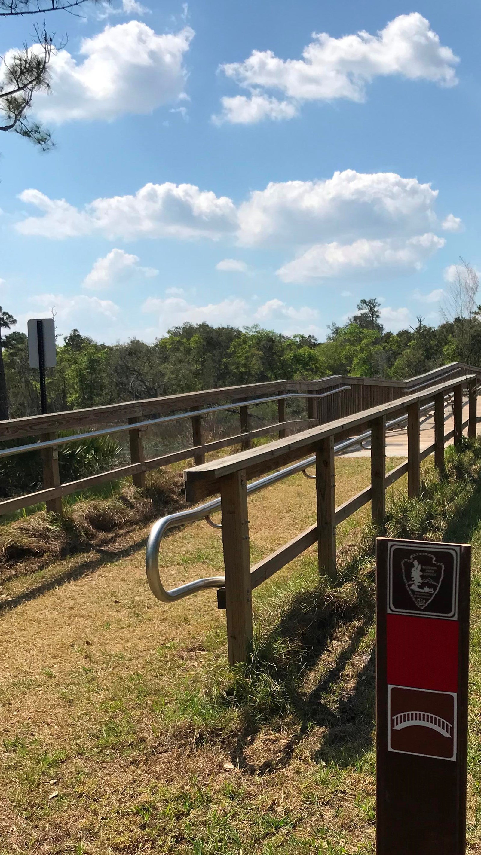 the start of a bridge with metal handle