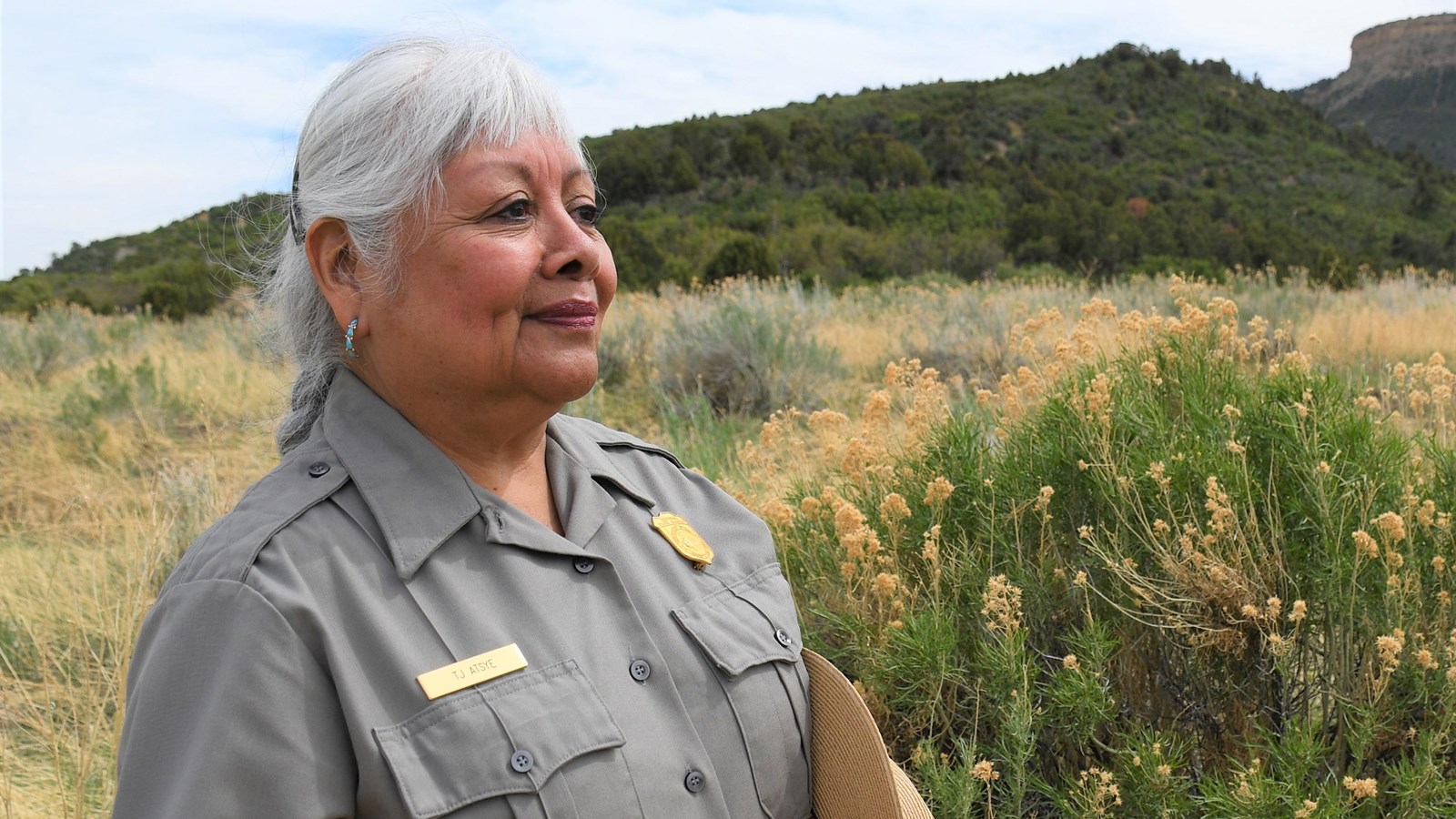 Ranger TJ stands in front of Point Lookout