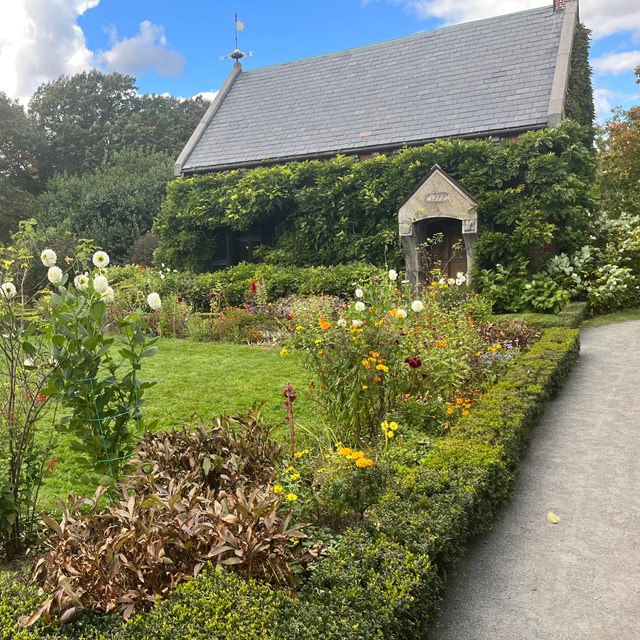 View of the Stone Library and the garden at Peace field