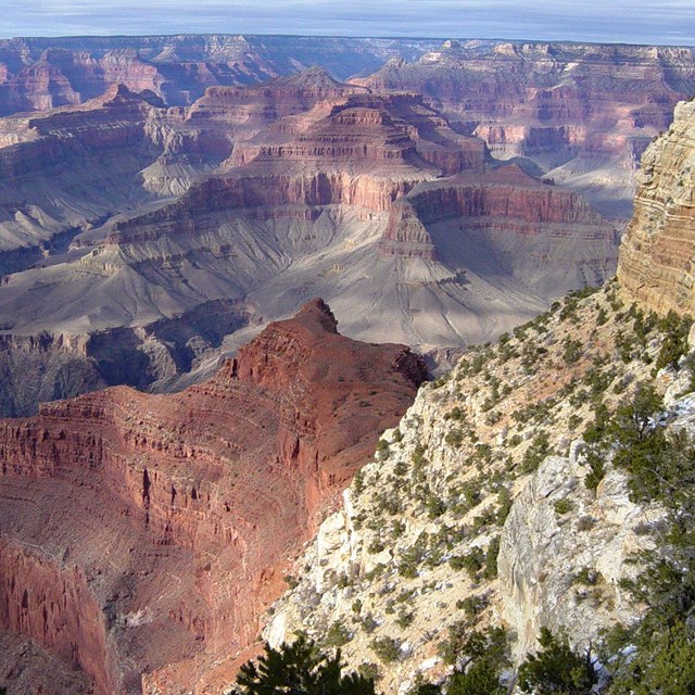 Photo of Grand Canyon rock layers and cliffs.