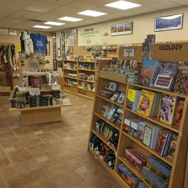 a gift shop stocked with books, souvenirs, and t-shirts.