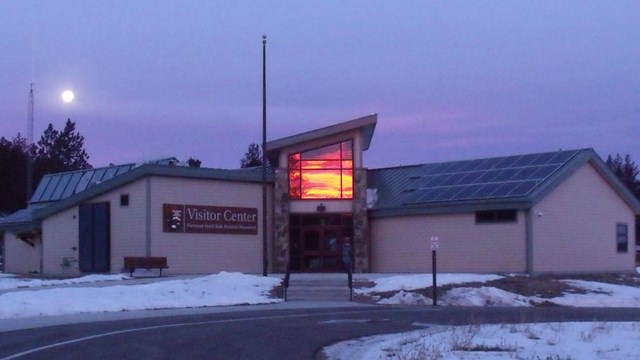 View of Visitor Center with reflection in window