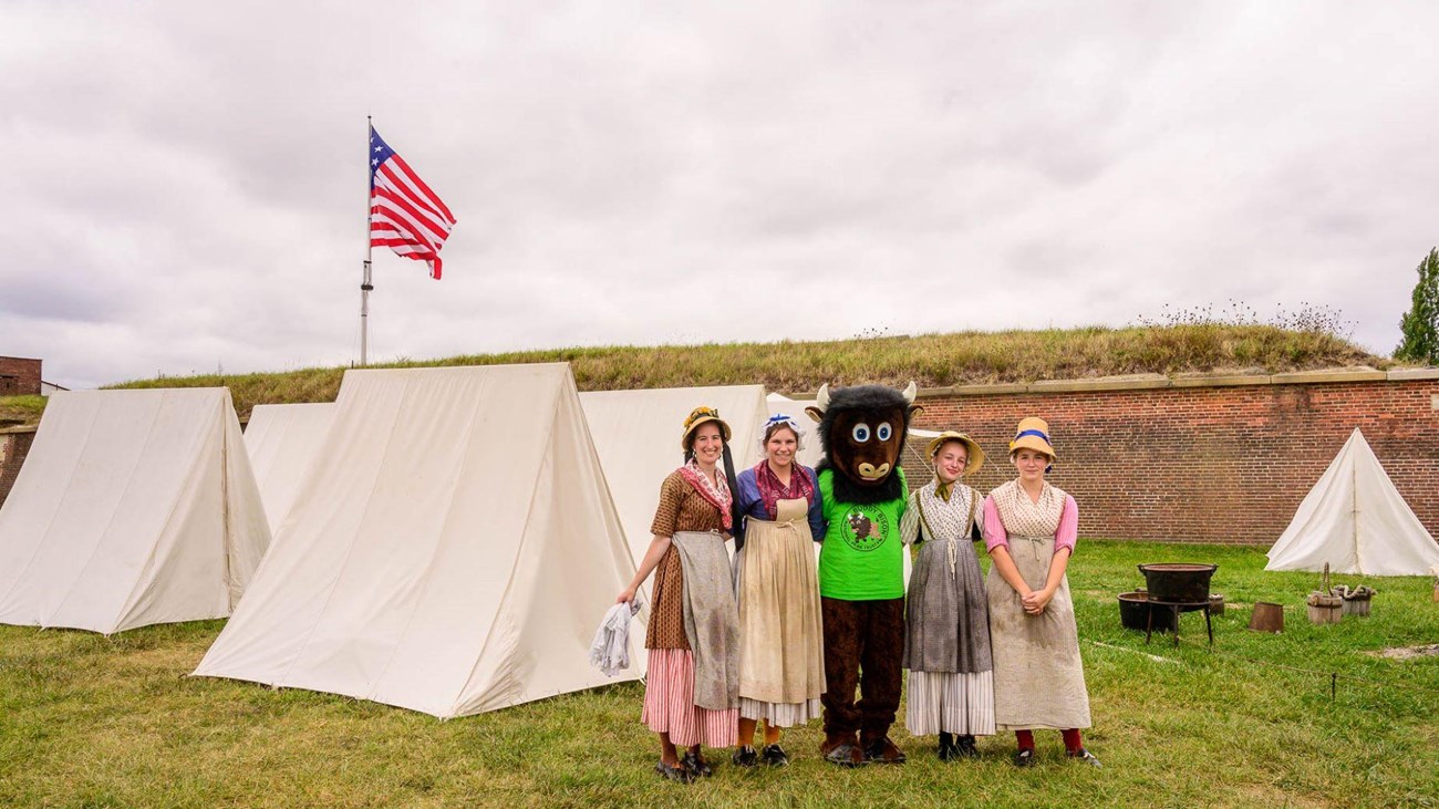 A picture of Living History with Buddy Bison right outside the fort next to the ravelin.