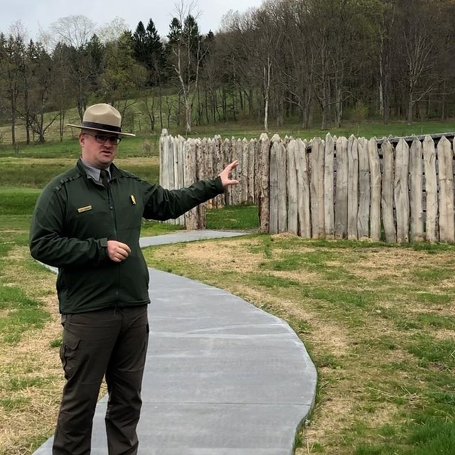 Park Ranger standing in front of Fort Necessiyt