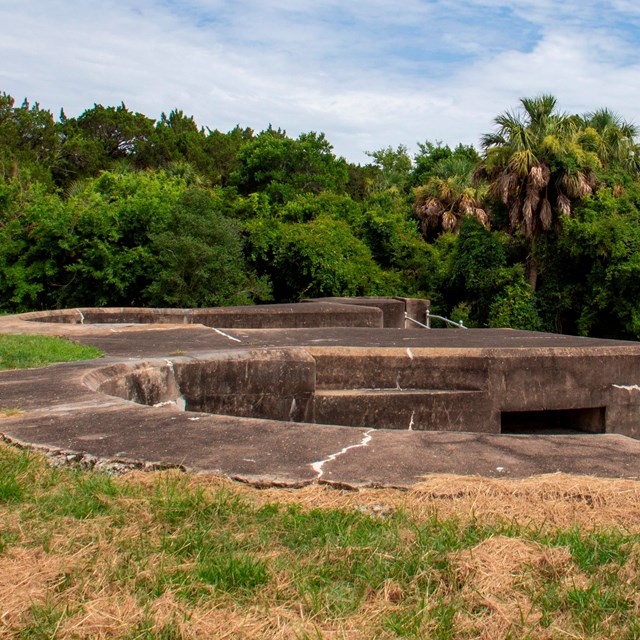 The concrete emplacements where guns would be located. 