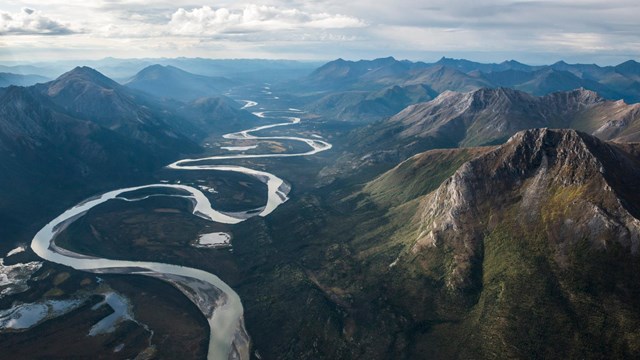 Aerial view of the meandering Alatna River through the Brooks Range mountains