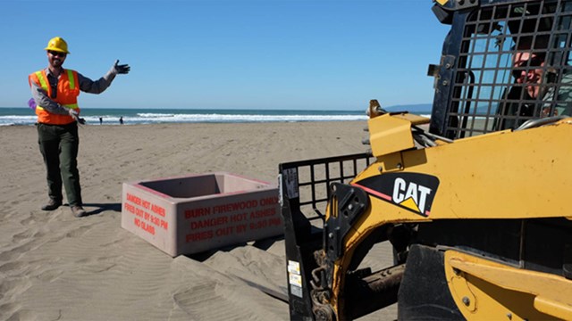 installing fire pits at Ocean Beach