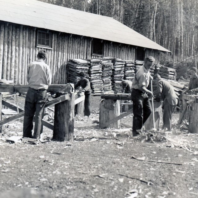 men constructing cedar shingles