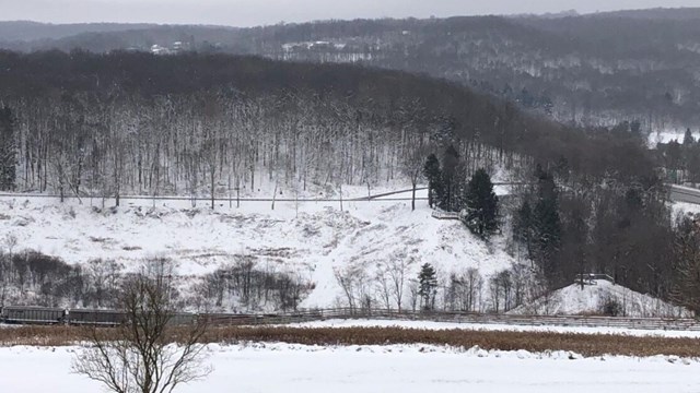 The remains of hte South Fork Dam in the snow.