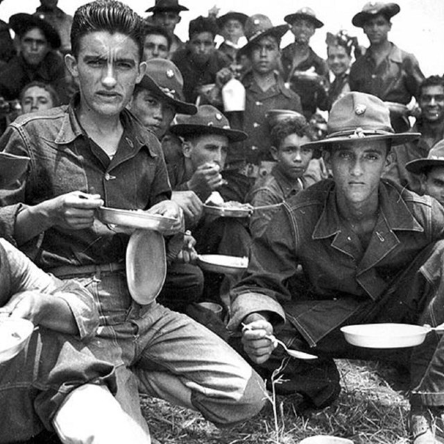 Historic black and white photo of Latino military servicemen 