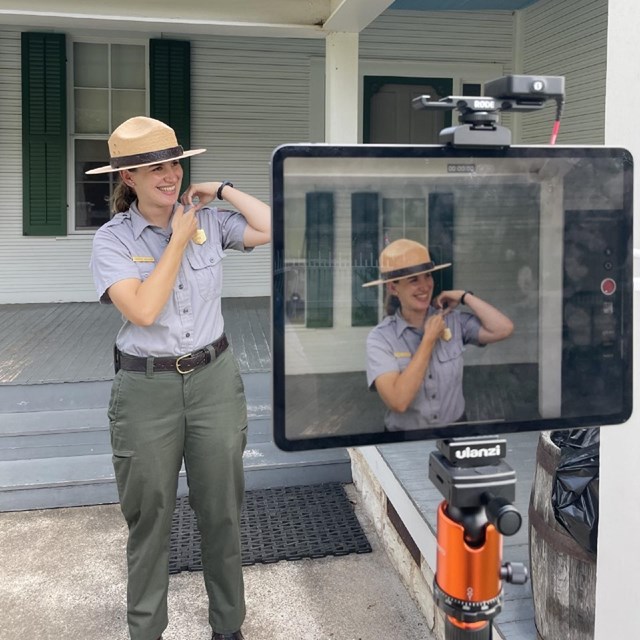 Park ranger standing in front of camera