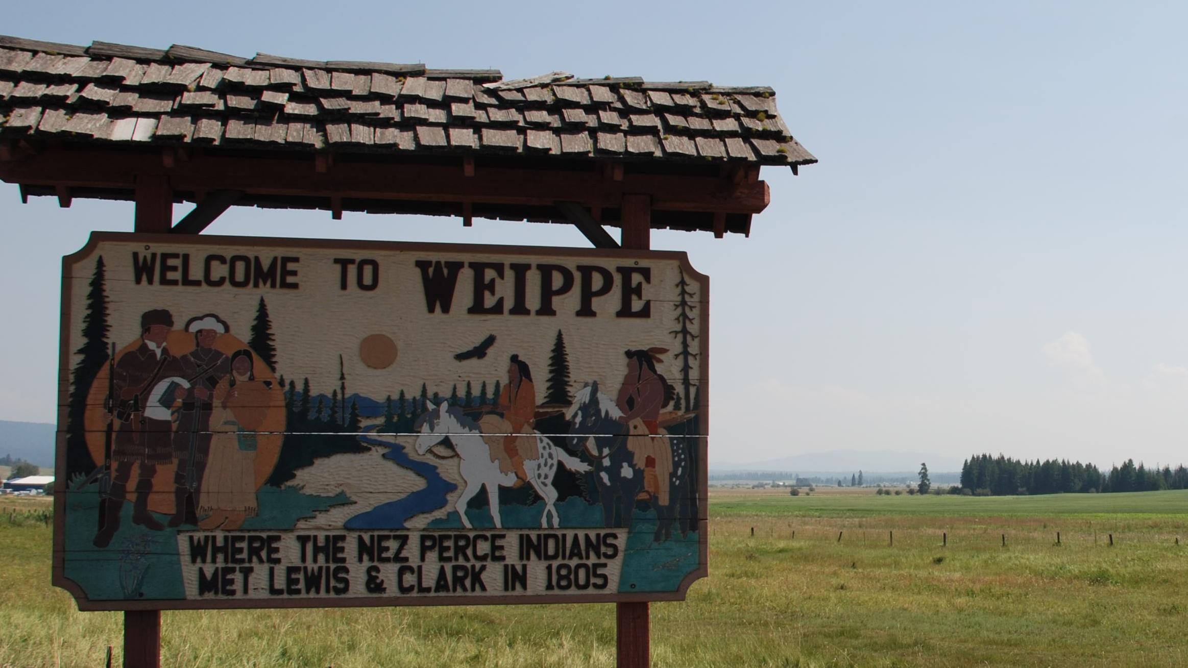 Wooden sign that reads 